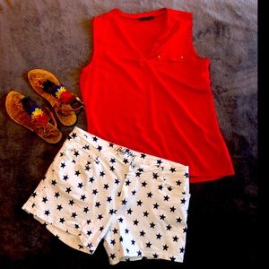 Stretchy white jean shorts with blue stars